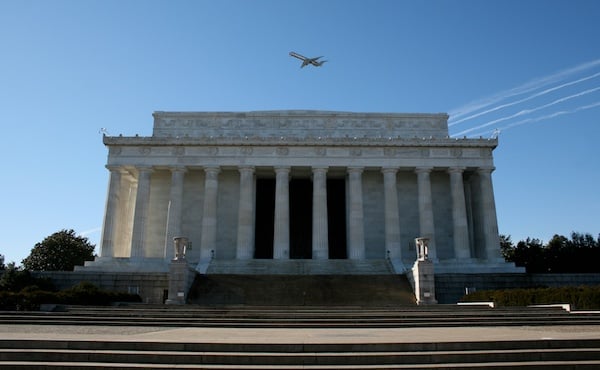 Lincoln Building Photo of a building with a colonnade against the blue sky, demonstrating the use of vertical lines in photography composition
