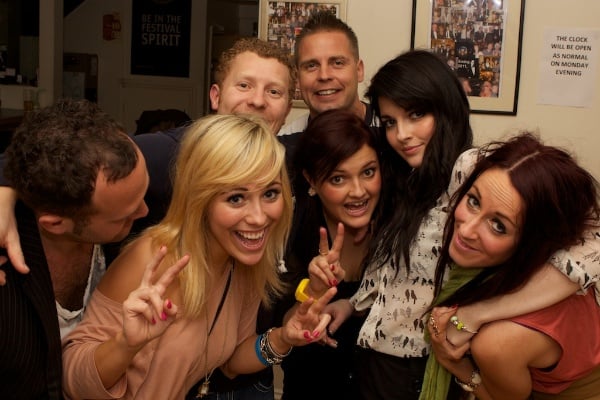 7.1-50-400-1 group of people smiling and having fun at a party