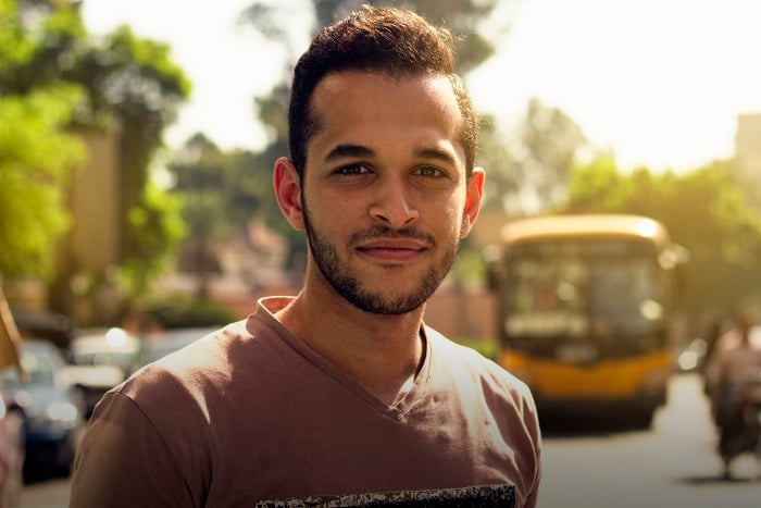 An outdoor portrait of young man taken with a 50mm lens