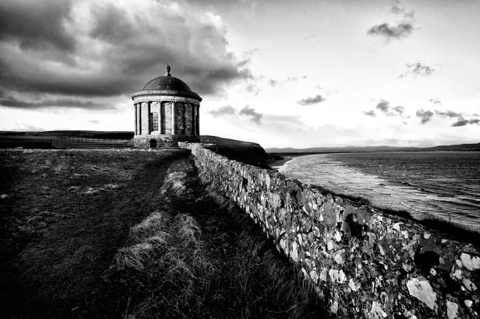 A sea wall with strong contrast between negative spaces 