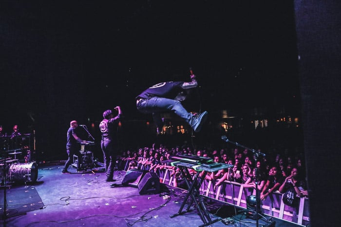 Photograph of William Control from backstage. High-speed photography caught the artist mid-jump.