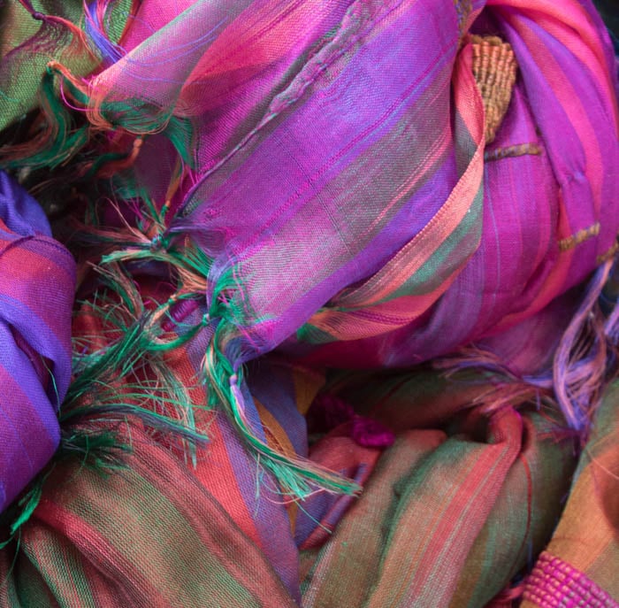 A close up of colored fabrics