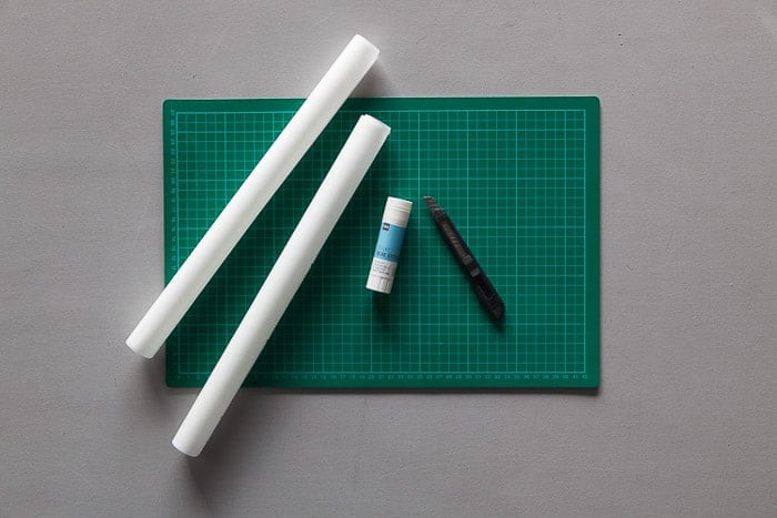 Overhead shot of the tools you need to make your own photography light box