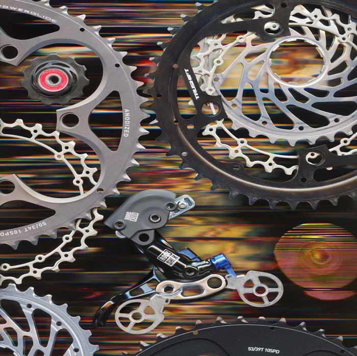 A scanography piece using 100 bicycle parts titled 