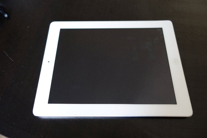A white iPad tablet - travel photography tips for best way to backup photos