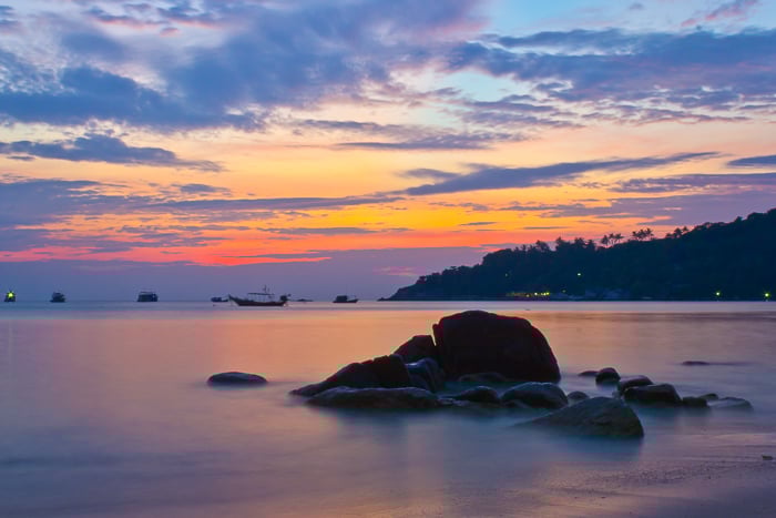 Landscape photography of a sunset at Chalok Baan Kao beach in Ko Tao. Travel photography shot list.