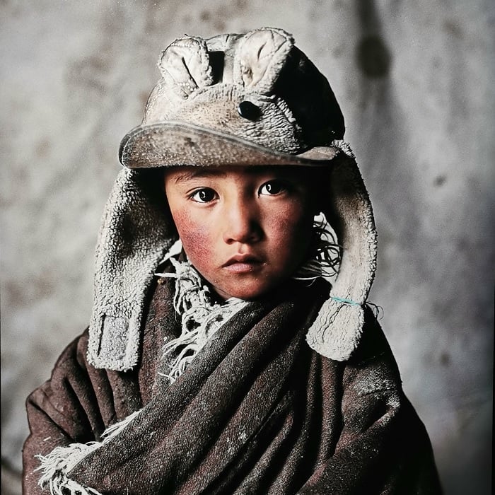 Portrait of Mongolian child in a hat