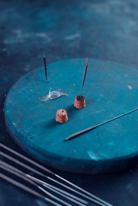 sparklers kept steady using bottle corks