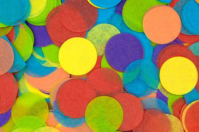Colored diy photography backdrops made from tissue paper cut into circles