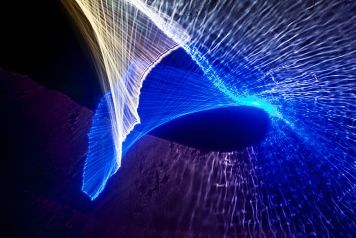 Refractograph made by light passing through the stem of a wine glass.