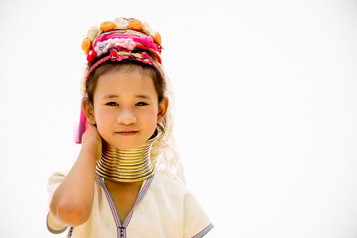 A high key portrait of a Thai girl in traditional clothing