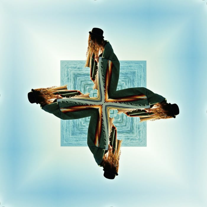 girl against a blue background with kaleidoscope effect