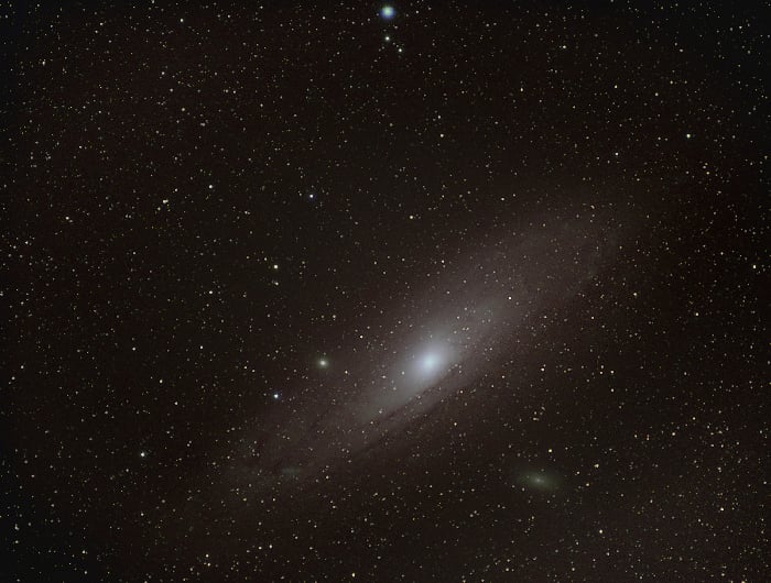 Andromeda in the night sky, flipped horizontally and vertically.