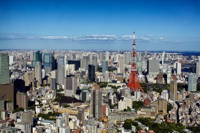 The iconic Tokyo Tower among a sprawling cityscape - best photography location in Tokyo