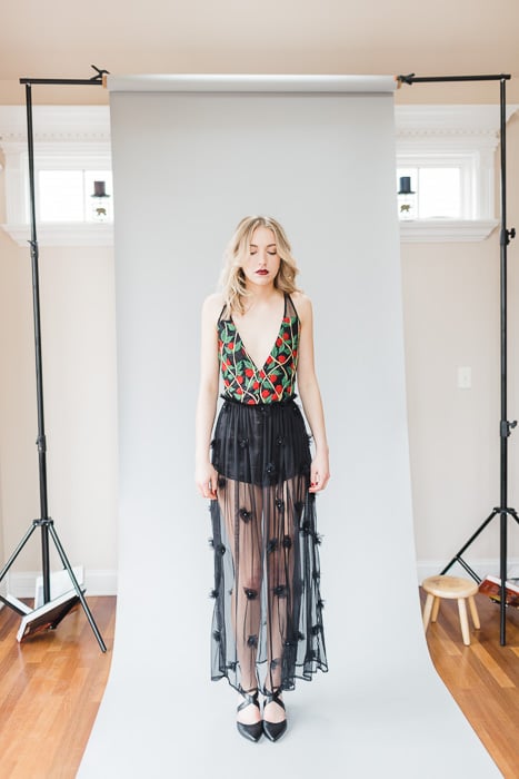 A female model posing in a studio - photography studio equipment