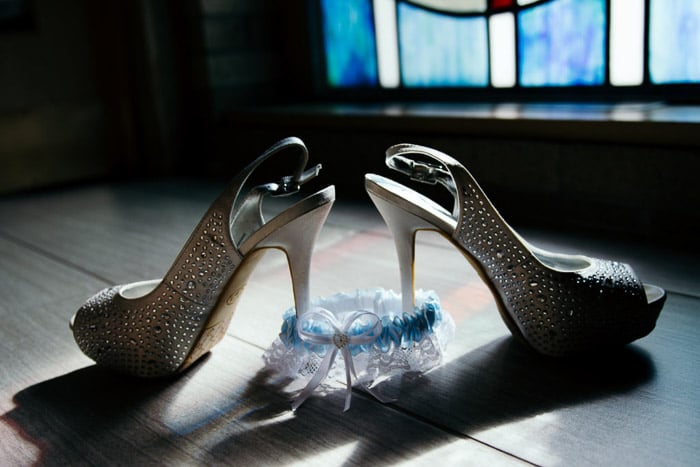 A still life of sparkly shoes takin with hard light photography