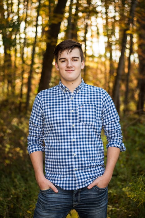 Bright and airy outdoor portrait of a young boy shot using soft light photography