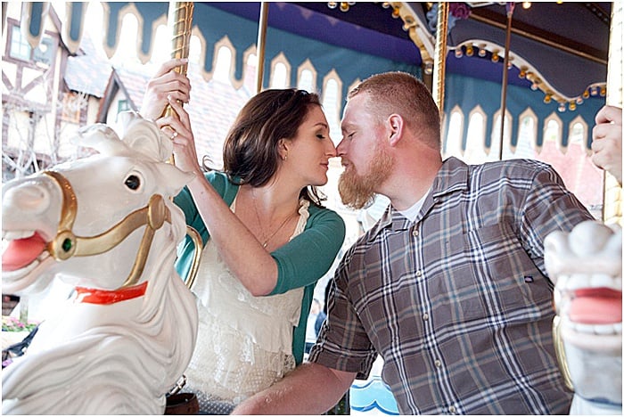 A romantic portrait of a couple on a carousel ride - emotional photography
