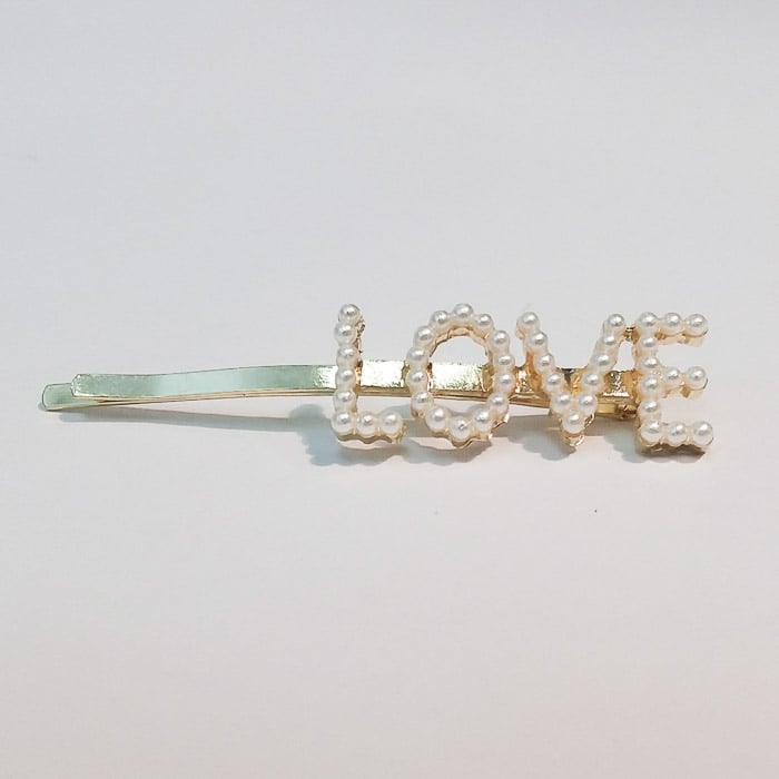 smartphone product photo of a hairclip on white background