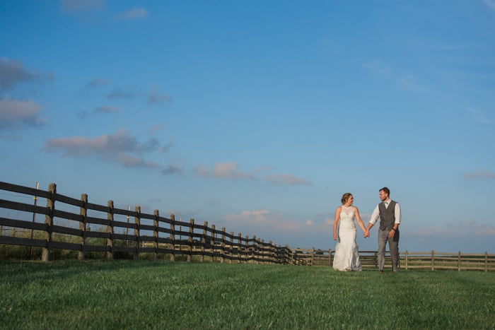 bright and airy wedding photography of a couple posing casually outdoors