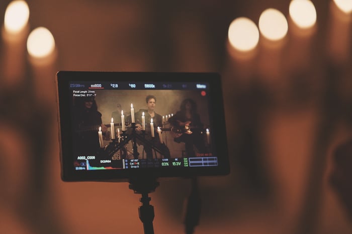 Atmospheric concert photography seen through a device screen