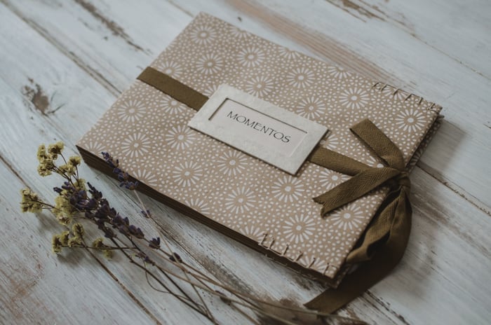 a person making a DIY wood backdrop for photography