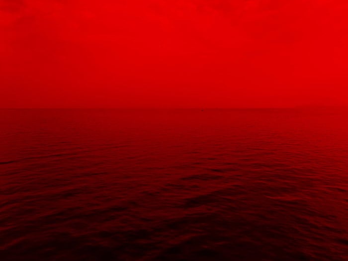 a red toned seascape - symbolism in photography