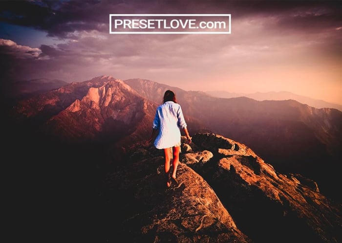 Photo of a girl walking on top of a mountain shadow crusher preset