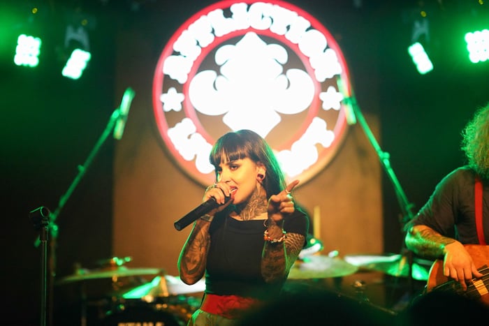 Concert photo of a woman singing