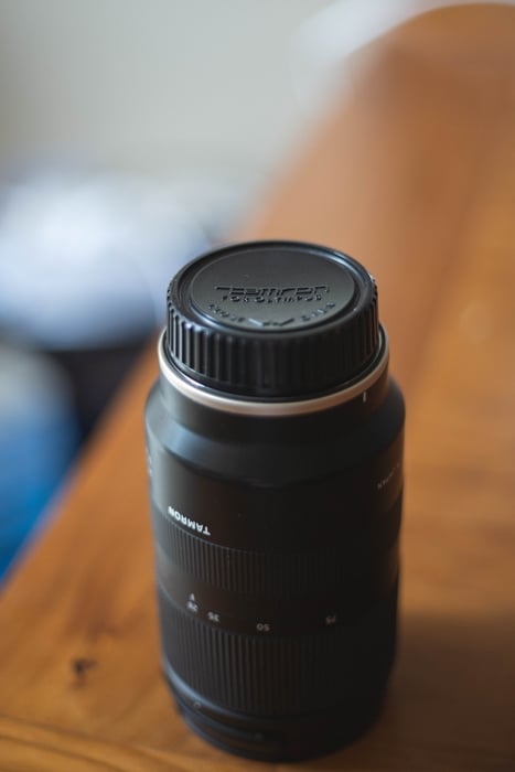 Still life photo of a Tamron lens highlighting Tamron lens abbreviations