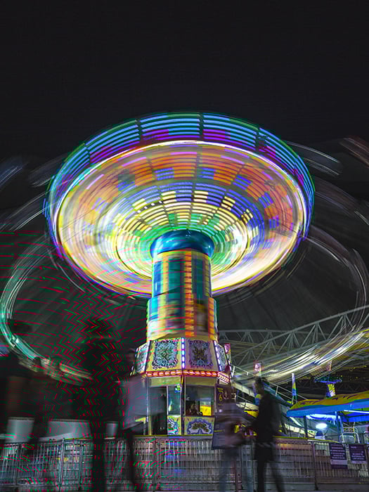 Motion blur photo of a ride at an amusement park