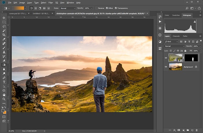 The person has been placed into the first landscape photo, but the colors do not blend well.
