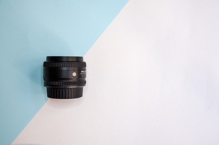 Zoom lens on a pastel background