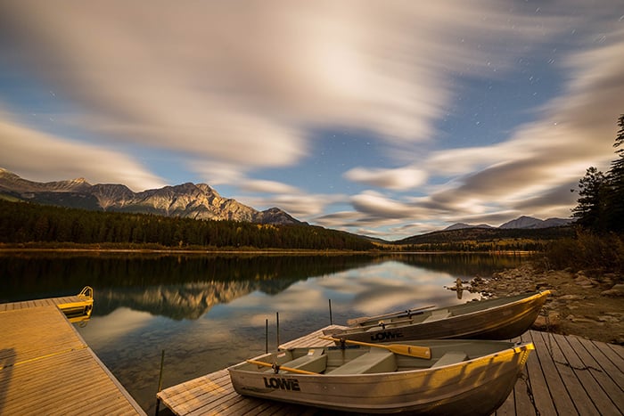 Photo of a lake with mountains in the back