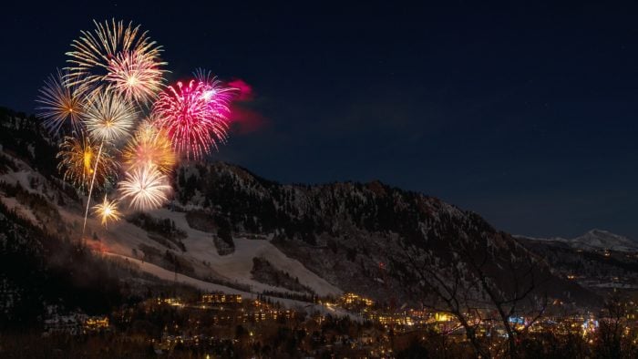 Photo of fireworks exploding on the mountain side