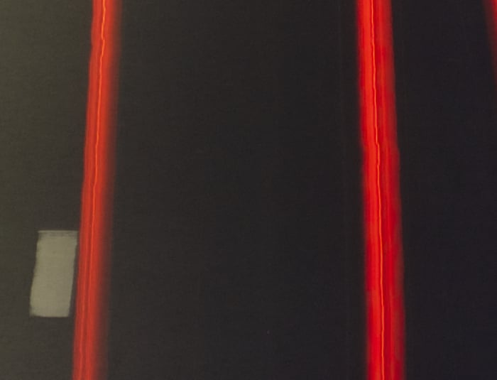 crop from a raw file showing a light trail