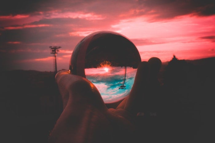 A pink sunset shot through a lensball