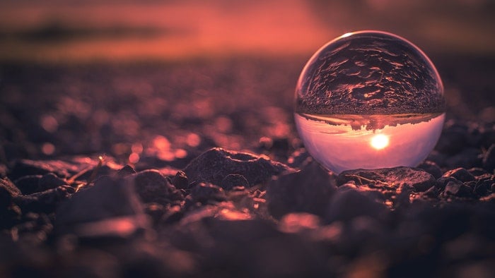 A beach sunset shot through a lensball