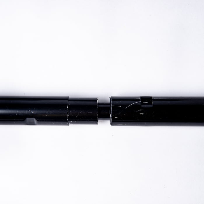 Closeup of horizontal rods being connected