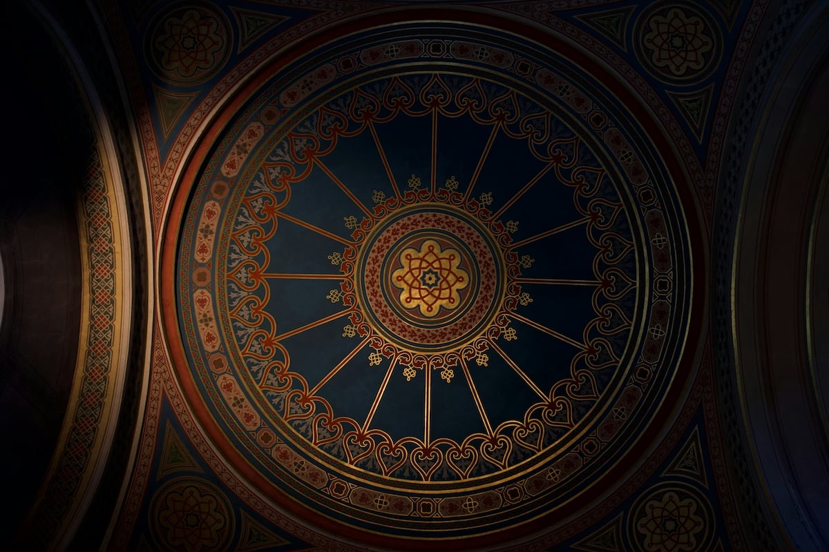 A circular ceiling detail showing radial symmetry for visual weight