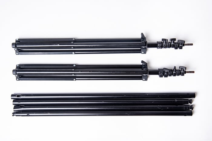 An overhead view of a background stand kit