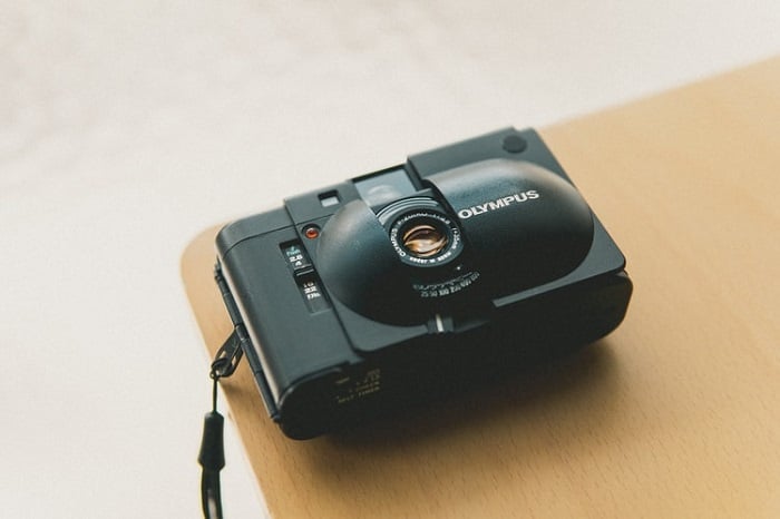 Camera with a black strap.