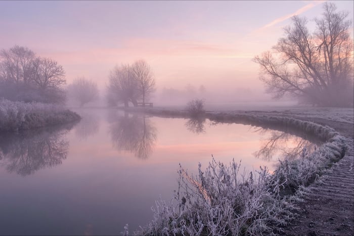 landscape photography: a still lake at dusk
