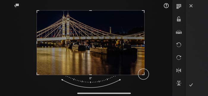 Lightroom Mobile screenshot of rotating an image by dragging a corner handle