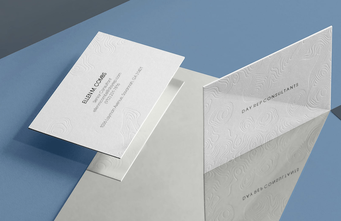 photography business cards with pressed design in them 