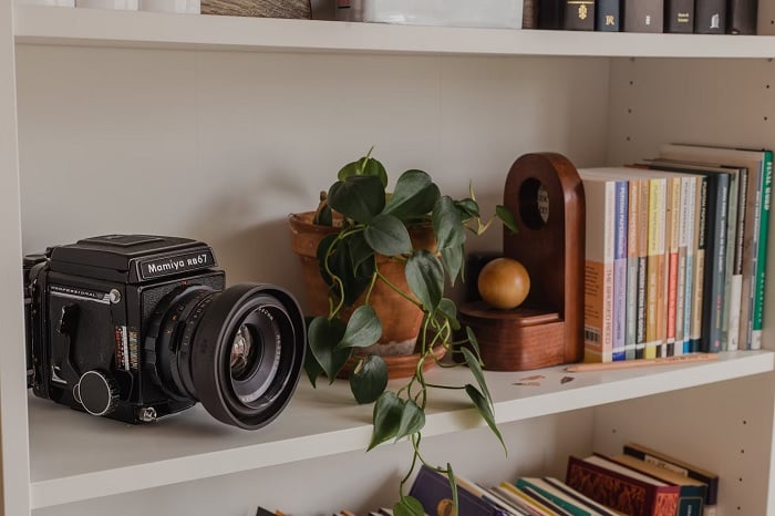Medium format camera on a book shelf
