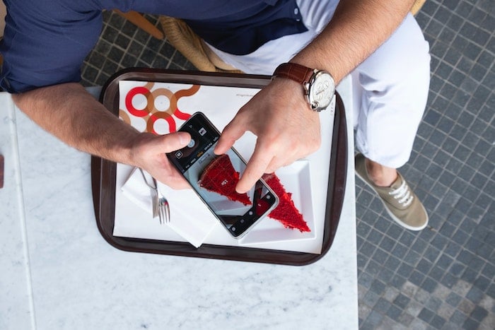 person zooming in on a photograph person zooming in on a photograph