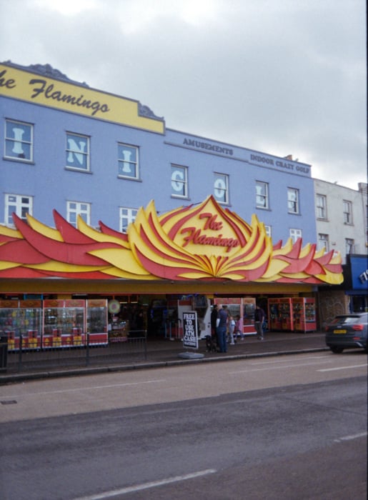 A colourful picture of an arcade called the flamingo
