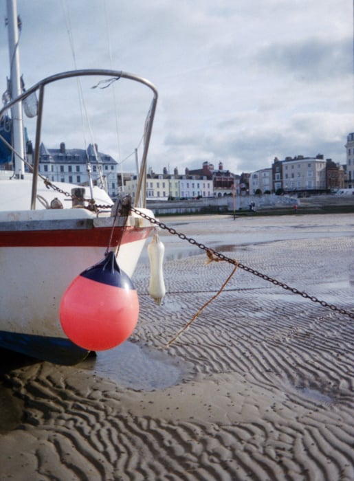 A moored boat with its floats attached