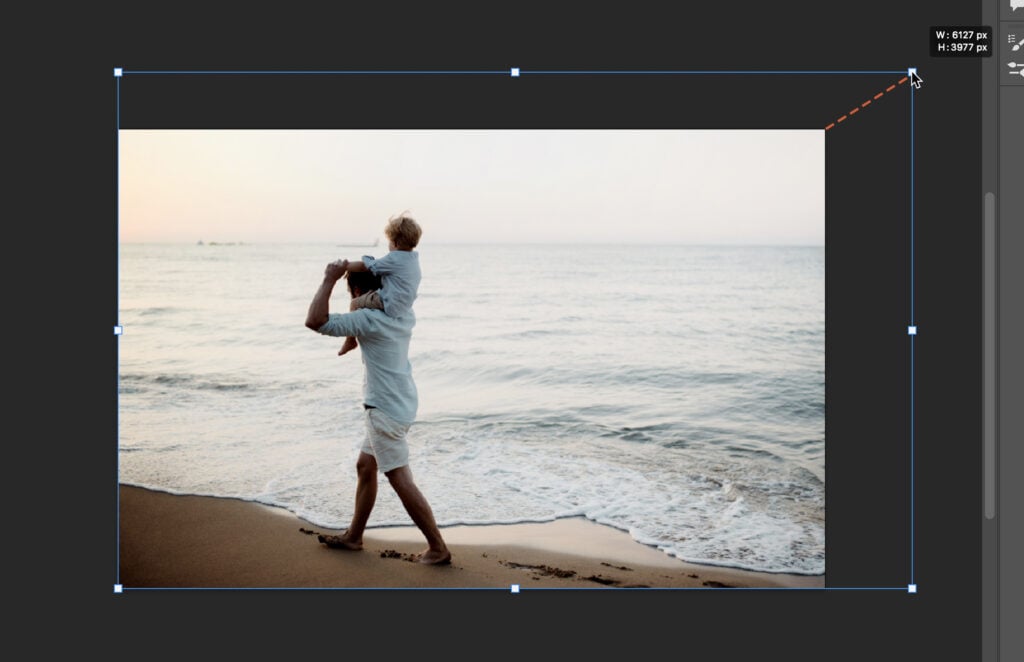 A photo editing software with a man and baby on the screen, showcasing the softwares features.